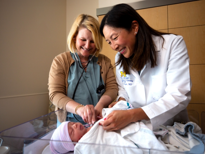 Dr. Helen Morgan and RN Mindy Magee care for a newborn at U-M Health Von Voigtlander Women's Hospital