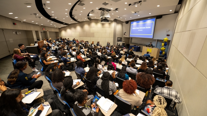 Pre-med pathways day students in a large lecture hall