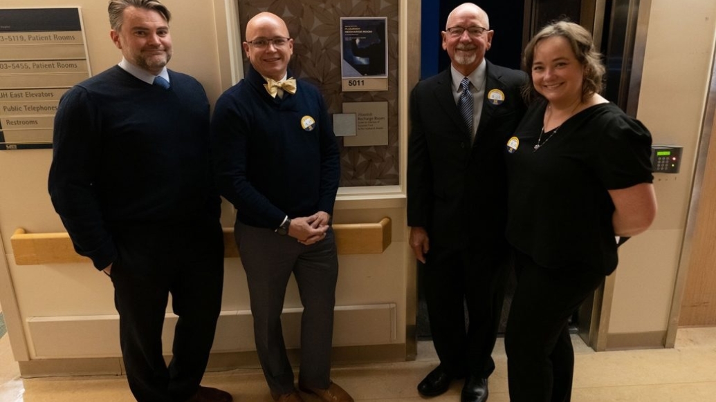 Dr. Martin Tuck (third from left) with son-in-law Ben, son Jeremy, and daughter Alison.