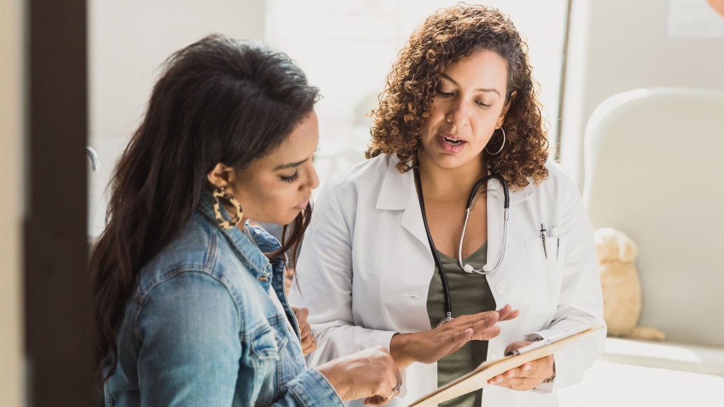 doctor with patient talking