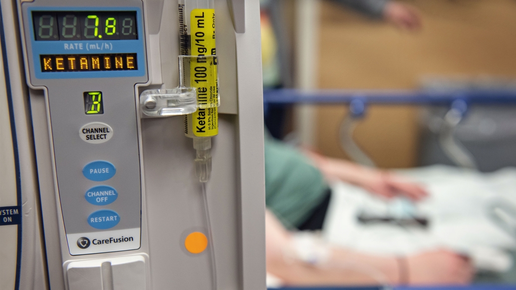 ketamine pump stock picture close up showing number grey blue yellow blurred background behind it