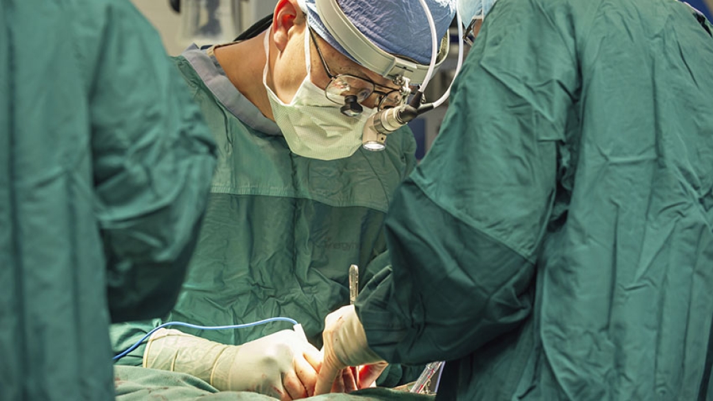 Dr. Yang performing surgery
