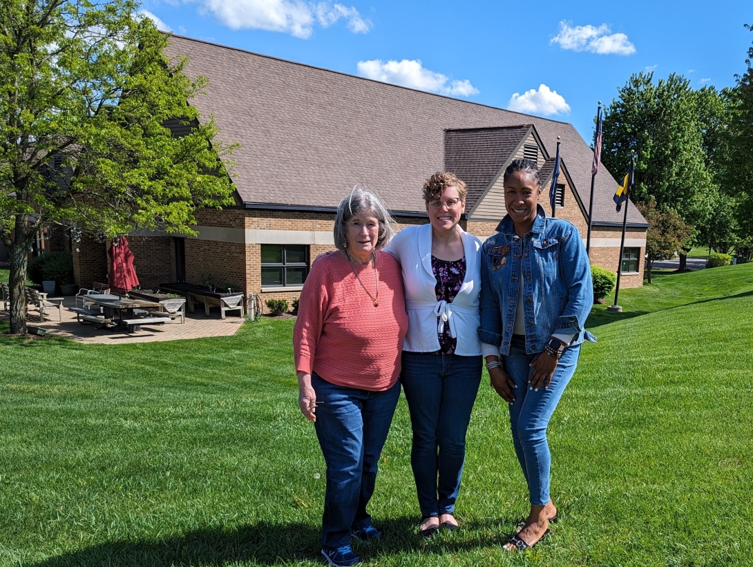 Turner staff stand in front of the center