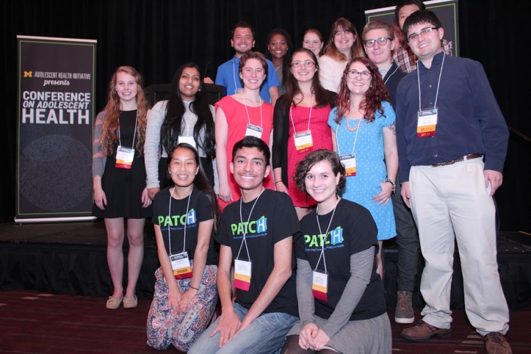 TAC TAC participants smile for photo at conference